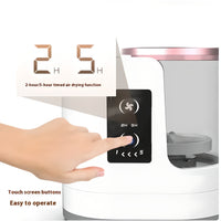 Hand pressing touch screen button on electric makeup brush cleaner with 2-hour and 5-hour air drying timer function