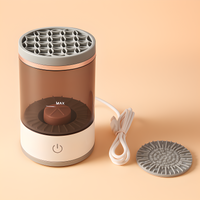 Electric makeup brush cleaner with a brown transparent rinse tank, detachable silicone brush holder, and USB power cord, designed for deep cleaning and drying makeup brushes.