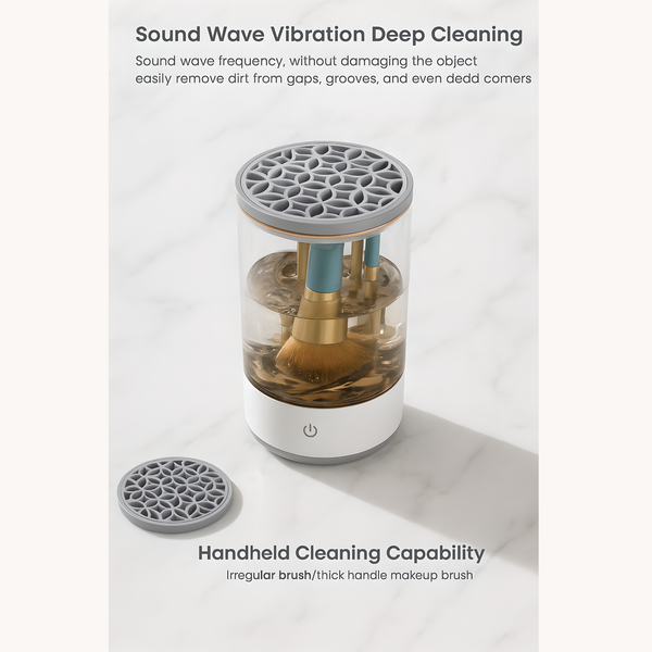 Electric makeup brush cleaner using sound wave vibration technology for deep cleaning, shown with brushes inside the transparent container filled with water, silicone lid on top, and detachable cover on marble surface.
